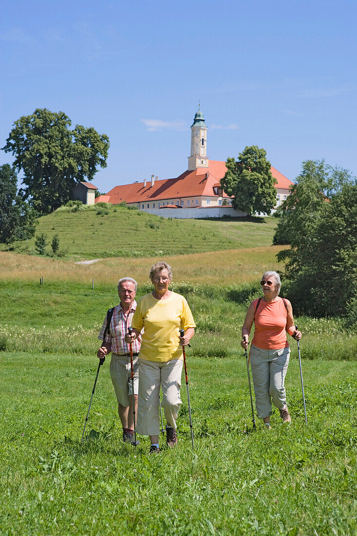 A group of pensioners hiking, Reutberg monastery, Upper Bavaria, Bavaria, Germany, Europe