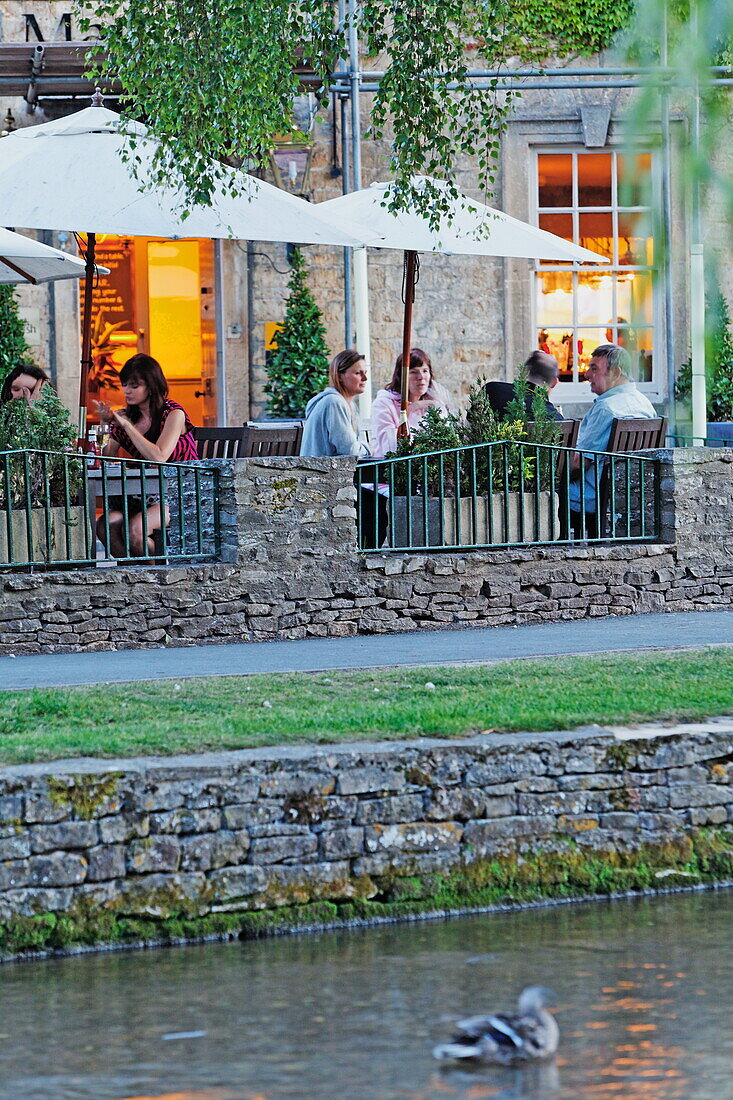 Cafe of the Olde Manse Hotel at the Windrush river in the evening, Bourton-on-the-water, Gloucestershire, Cotswolds, England, Great Britain, Europe