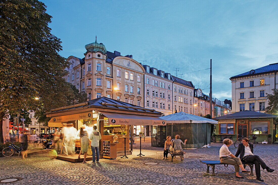People at Wiener Platz square in the evening, Haidhausen, Munich, Upper Bavaria, Bavaria, Germany, Europe