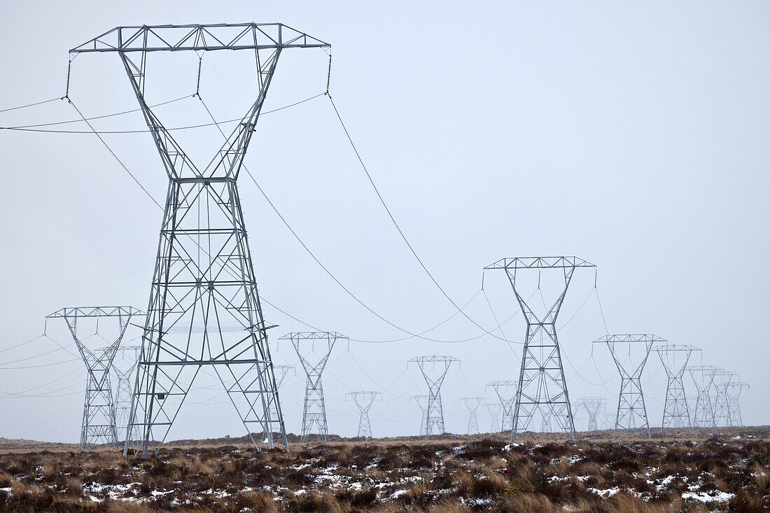 Power pylons on Rangipo desert during rain storm, Tongariro National Park.