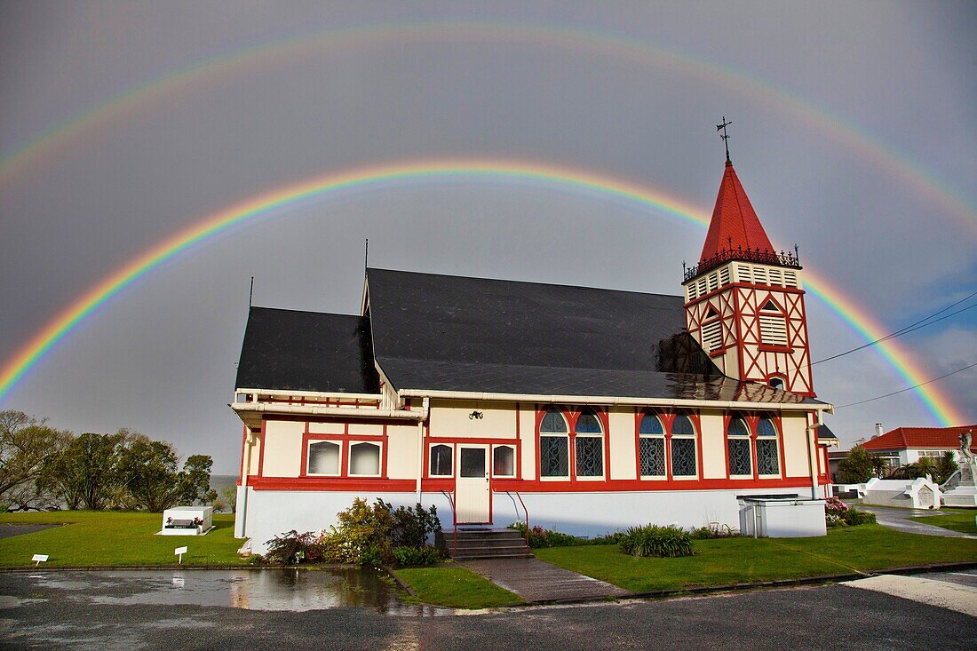 Rainbows over Maori owned Church of St Faith, Ohinemutu, Rotorua.