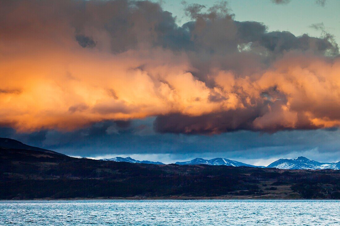 Rain clouds over Beagle Channel at sunset, Tierra del Fuego, Argentina.
