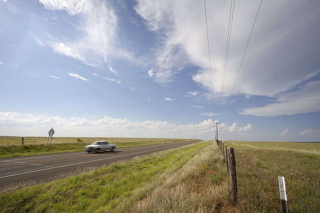 Lone Pickup Driving on Rural Highway, Texas, USA