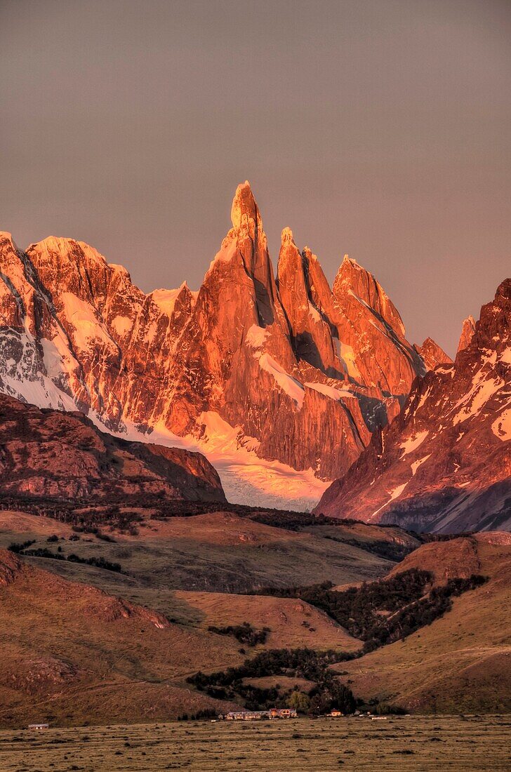 Dawn, Cerro Torre, La Quinta estancia in foreground, on edge Parque Nacional Los Glaciares, Patagonia, Argentina