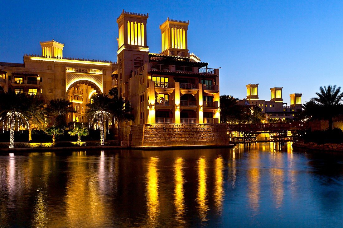 The Al Qsar hotel illuminated at night in the Madinat Jumeirah souq in Dubai, UAE