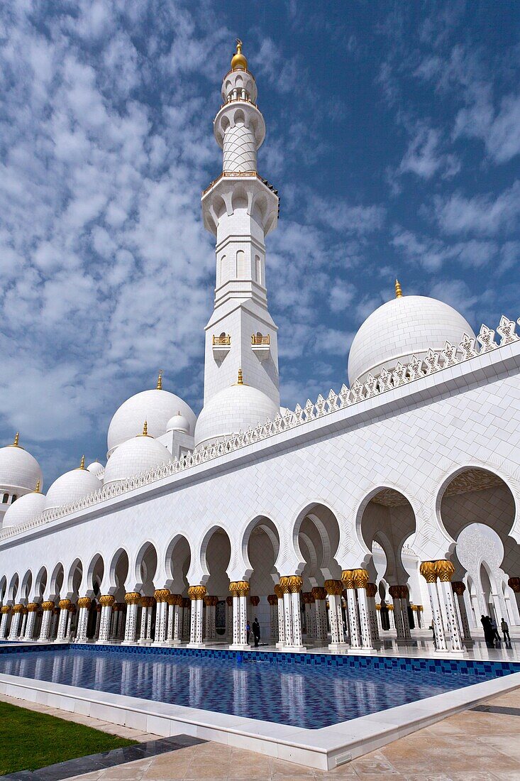 Exterior domes, arches and minarets of the the Sheikh Zayed Grand Mosque in Abu Dhabi, UAE