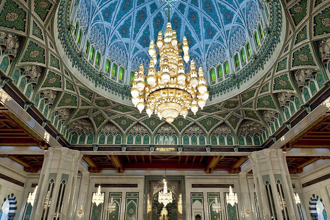Decorative chandelier with ceiling detail in the prayer room of the Grand Mosque in Muscat, Oman