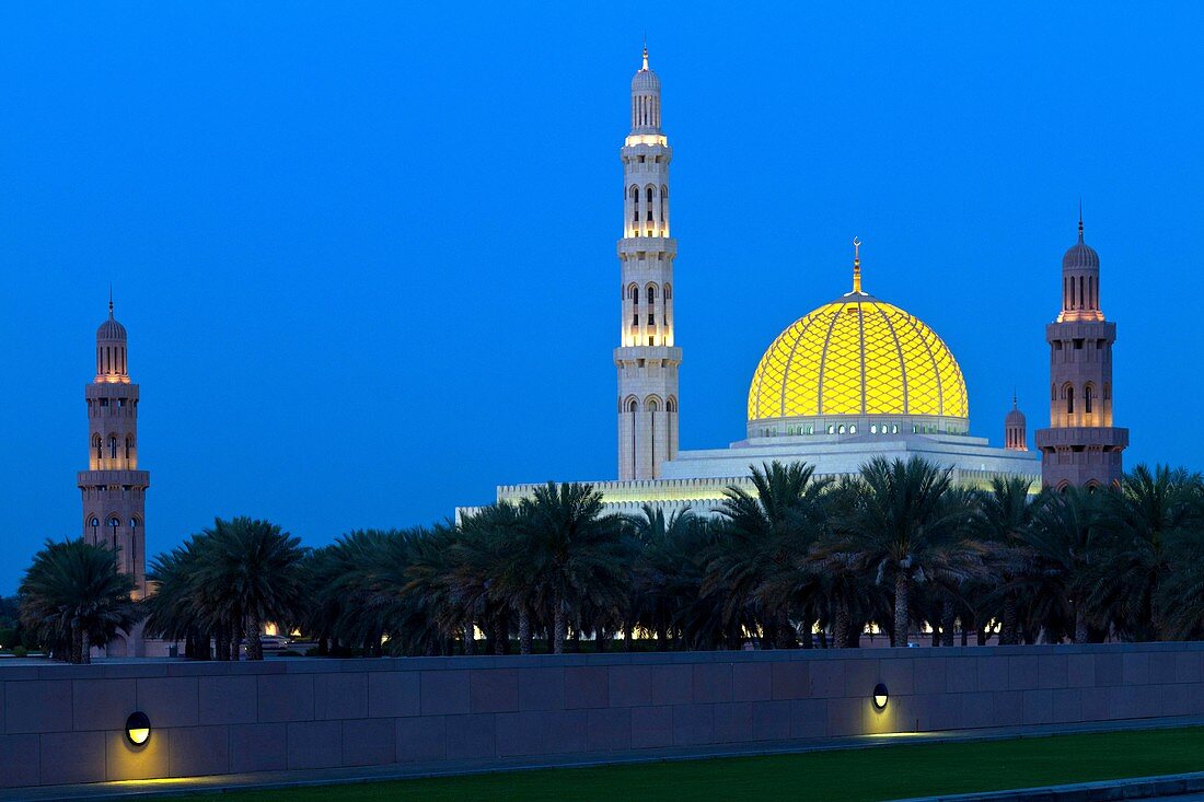 The Grand Mosque illuminated at night in Muscat, Oman