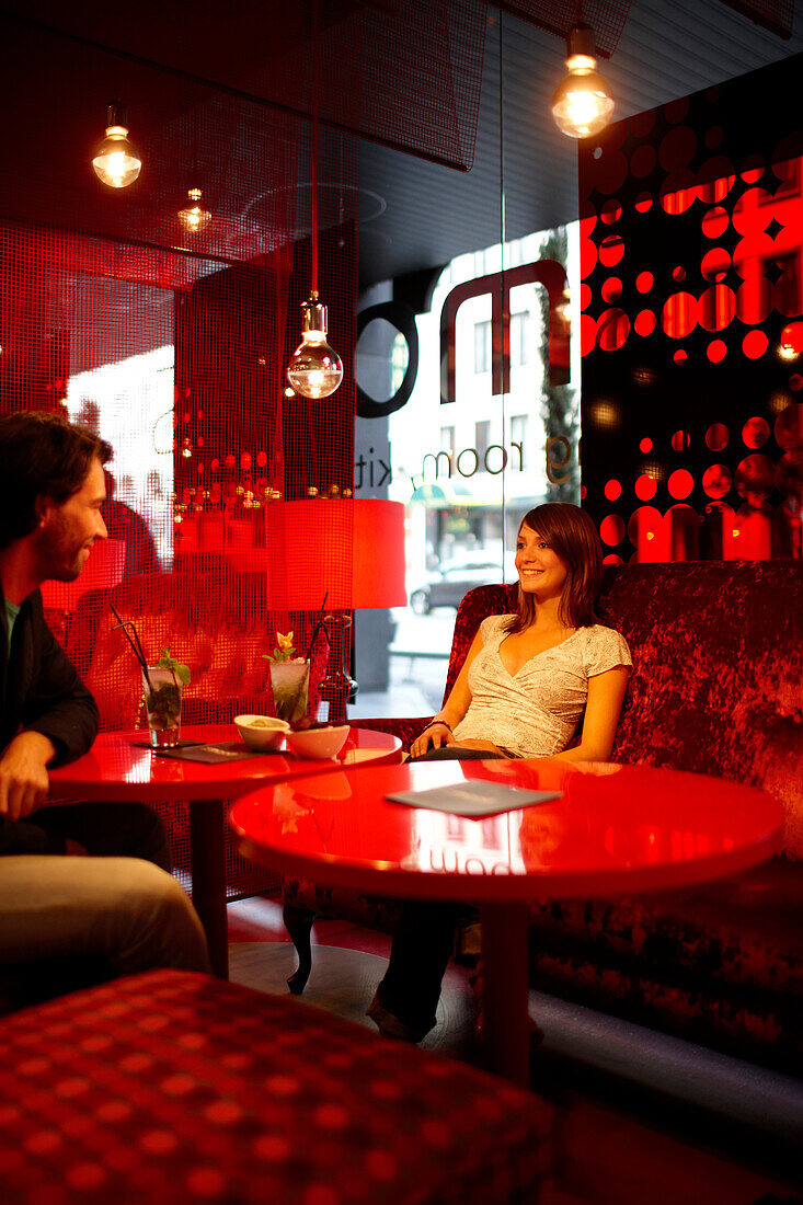 Couple inside hotel's on-site restaurant, Brussels, Belgium