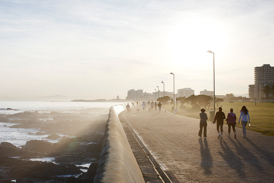 Joggers at the Seapoint boardwalk, Atlantic Seaboard, Cape Town, South Africa, Africa