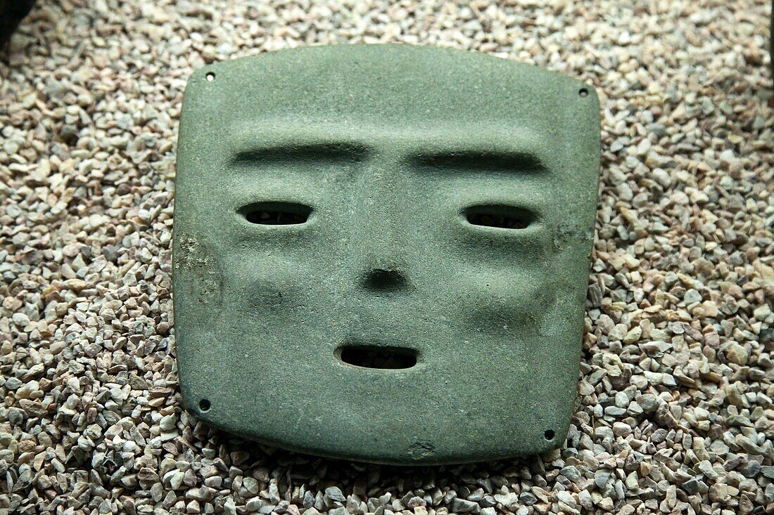 Pre-Columbian stone mask at Templo Mayor Museum, Mexico City