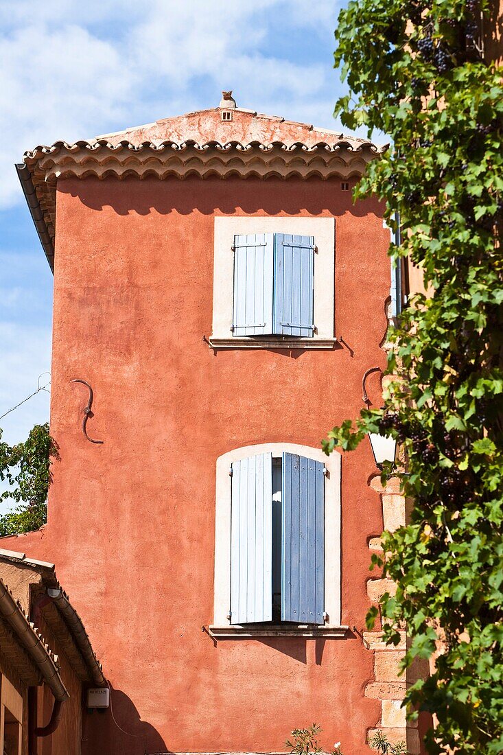 Colorful ochre house in Roussillon, Provence, France, Europe