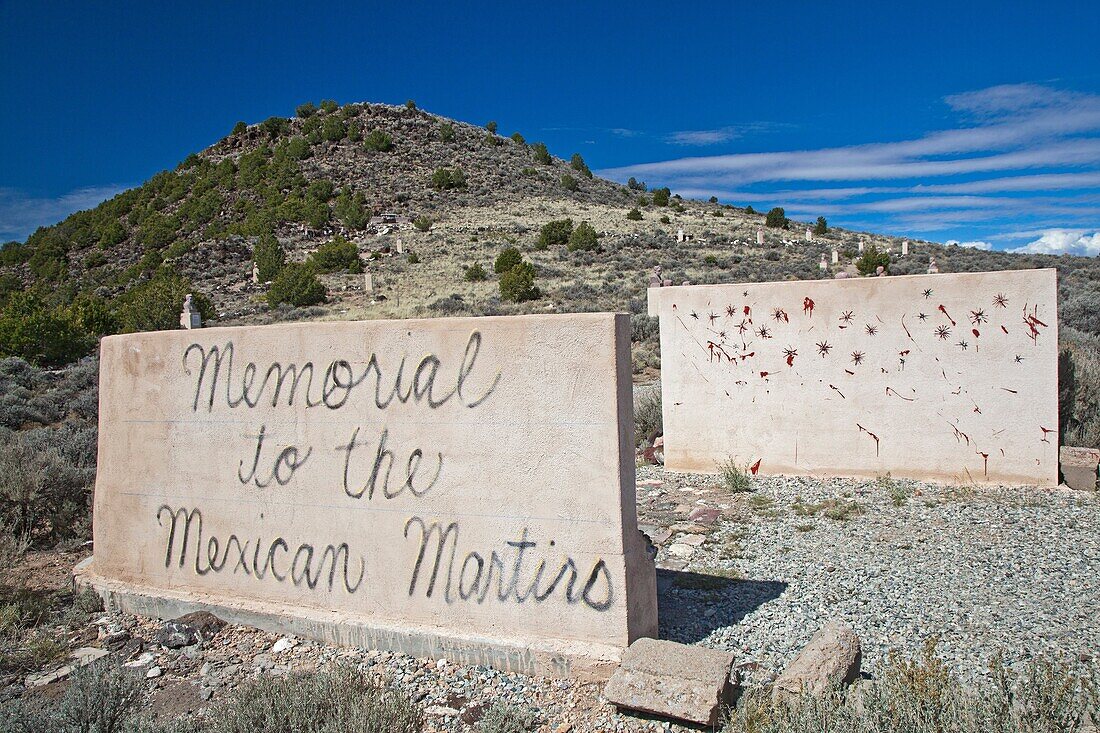 San Luis, Colorado - A memorial to Mexican priests who were martyred during the Christero rebellion in Mexico in the late 1920s  The memorial depicts a wall used by a firing squad, with busts of the martyrs on the hillside above  The rebellion was an upri