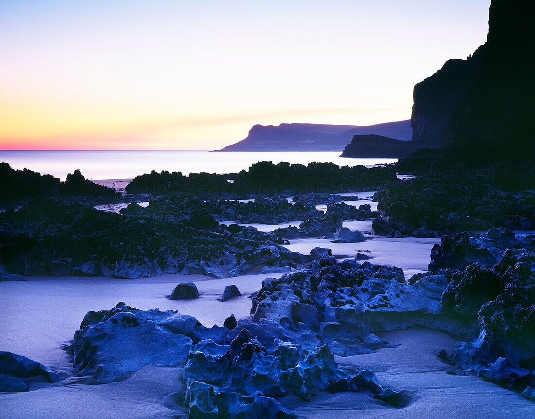 Dusk light at Mewslade Bay near Pitton on the Gower Peninsular, Swansea, South Wales