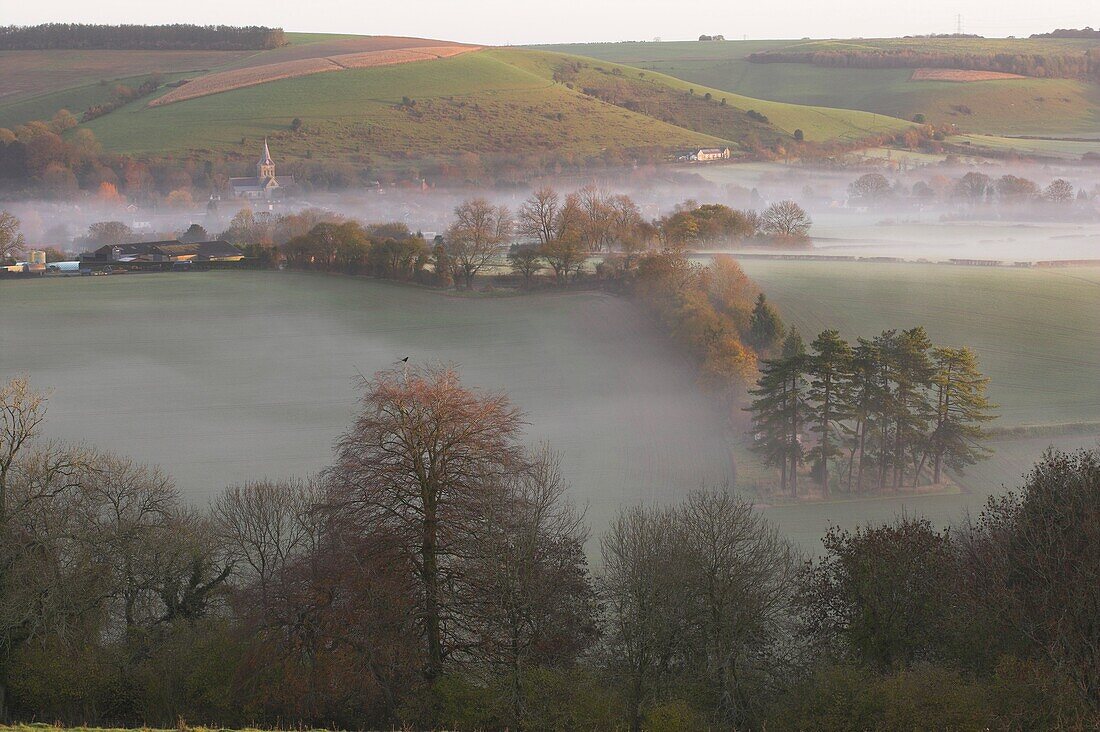 The Village of East Meon in the Mist at Dawn situated in the South Downs National Park Hampshire