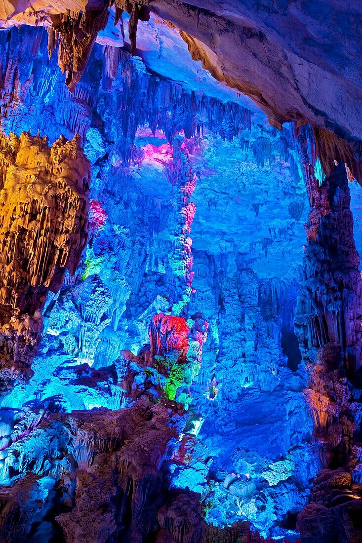 The beautifully illuminated Reed Flute Caves displaying the ´Singing Birds and Fragrant Flowers formation  Located in Guilin, Guangxi Provine, China