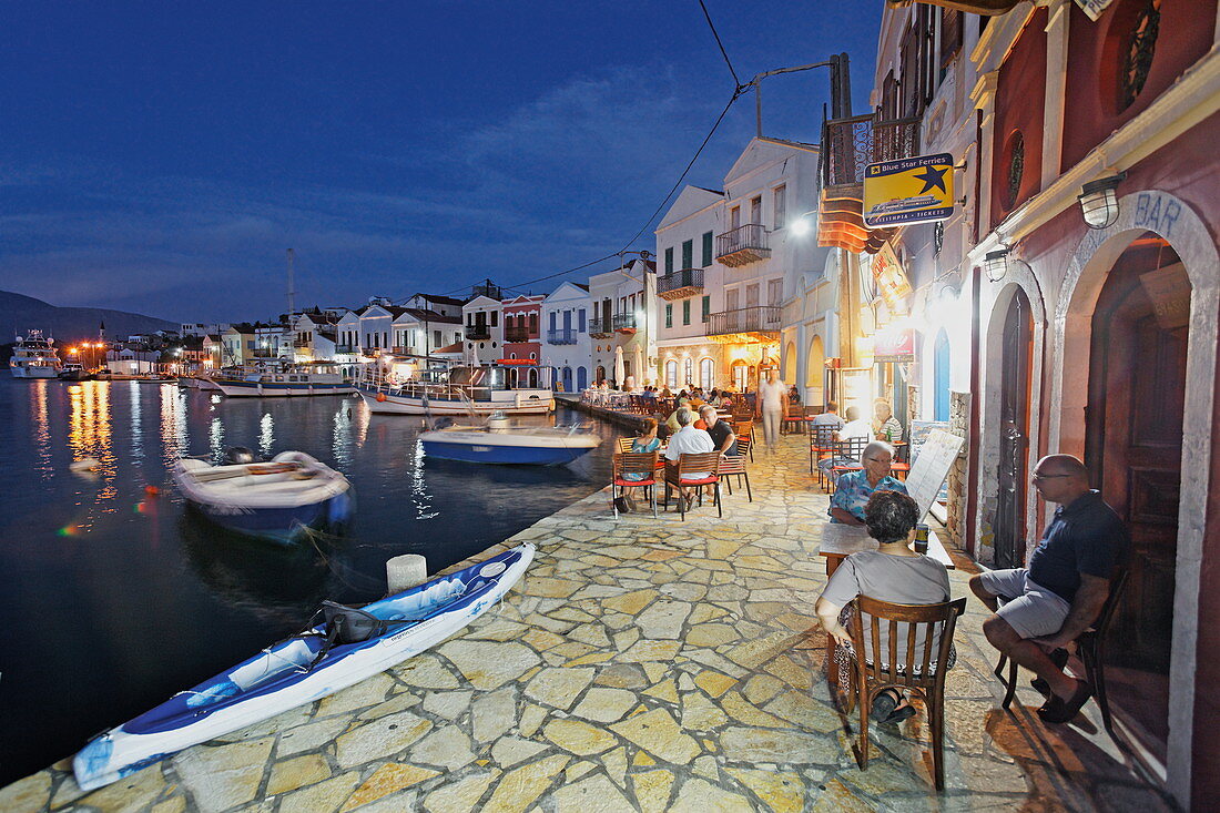 Cafes and Bars on the quay in the evening, Kastelorizo Megiste, Dodecanese Islands, Greece, Europe