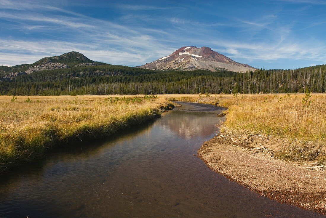 Soda Creek winds through sub-alpine meadows, South Sister volcano is in the distance  Willamette National Forest Oregon