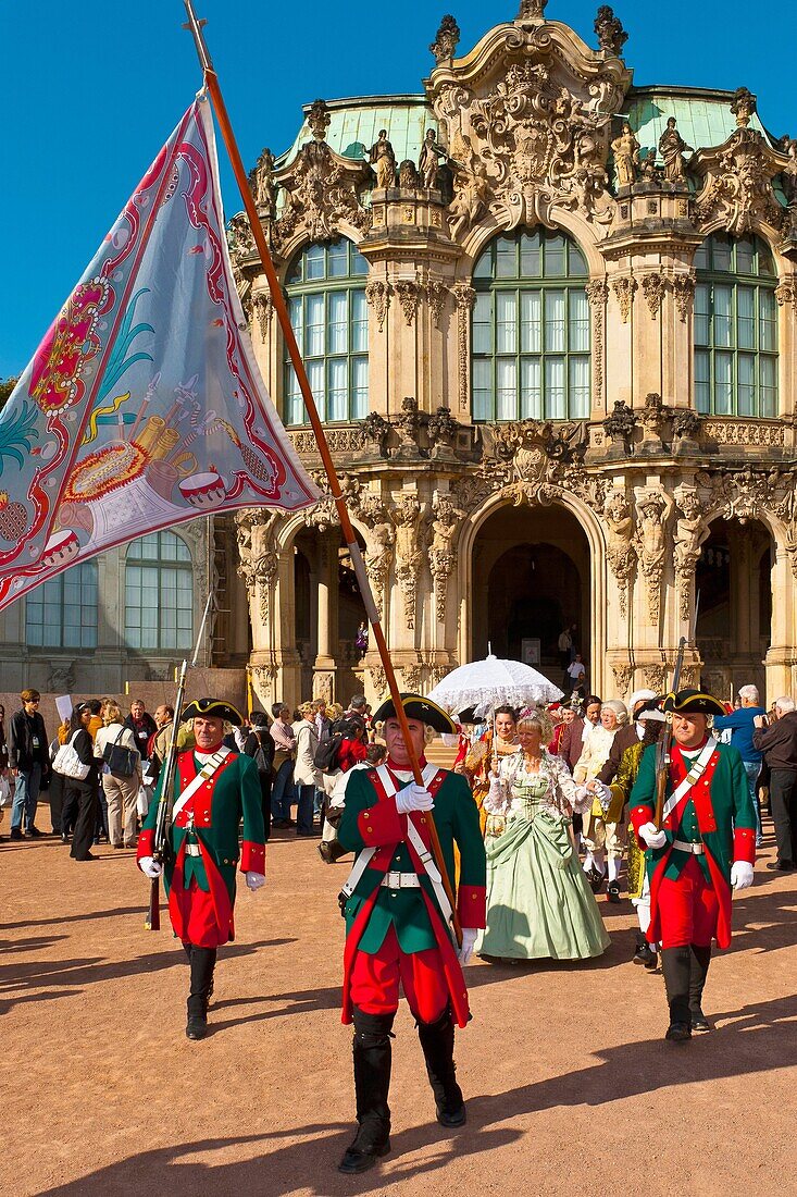 A procession of the Royal Court of August the Strong people in historical costume at the Dresden Zwinger, Dresden, Saxony, Germany
