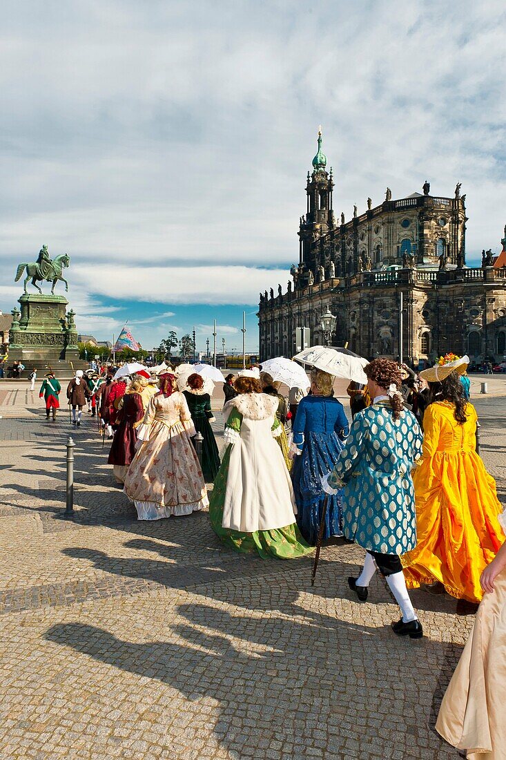 A procession of the Royal Court of August the Strong people in historical costume in Theaterplatz, Dresden, Saxony, Germany