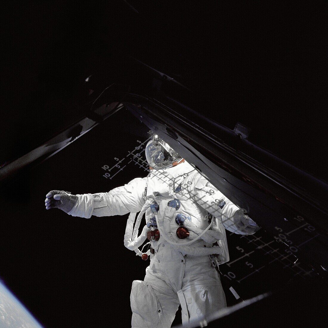 Astronaut Russell Schweickart, lunar module pilot, stands on the module´s deck during his spacewalk on the fourth day of the Apollo 9 mission  This photograph was taken from inside the lunar module ´Spider´ by mission commander James McDivitt   Apollo 9 w