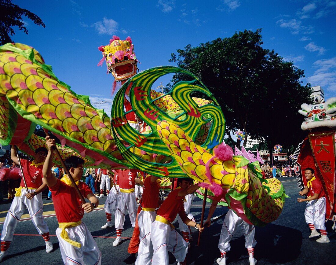 Asia, Asian, celebration, costumes, dragon, festive. Asia, Asian, Celebration, Costumes, Dragon, Festive, Holiday, Landmark, Men, Outdoors, Parade, People, Singapore, Asia, Symbolic
