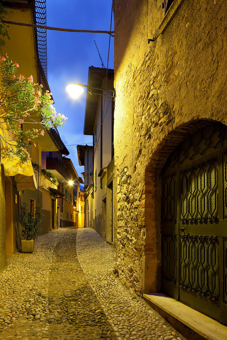 Alley in Malcesine in the evening, Malcesine, Lake Garda, Veneto, Italy