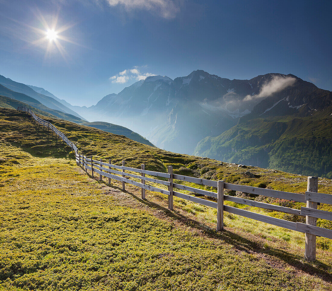 Fence, View from Oberberg towards Hochfeiler (3510m), Pfitsch Valley, South Tirol, Italy