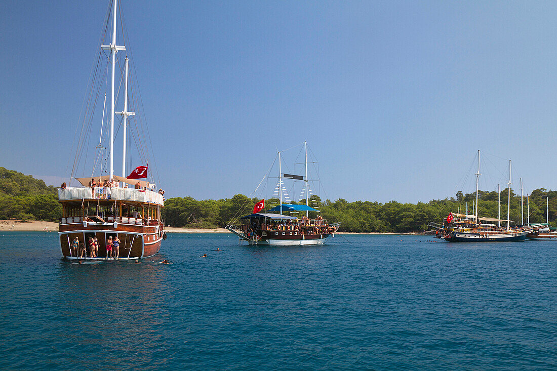 Tourist boats in the bay of the ancient citiy of Phaselis, Lycian coast, Lycia, Mediterranean, Antalya, Turkey, Asia