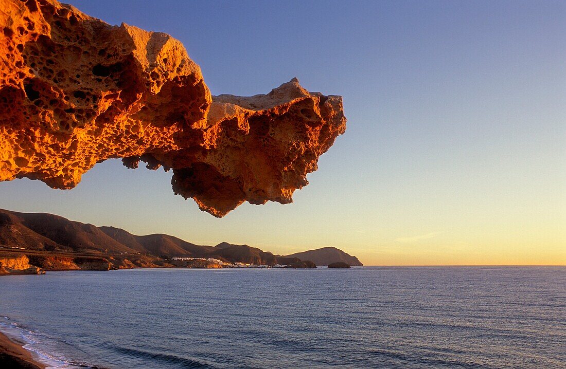 Gargoyle Rocks eroded by wind, sea water and sand in Playa del Arco Los Escullos  Cabo de Gata-Nijar Natural Park  Biosphere Reserve, Almeria province, Andalucia, Spain