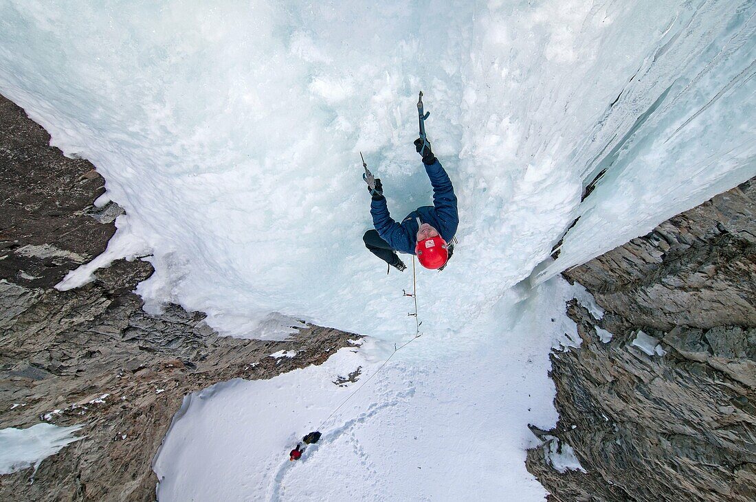 David Weber ice climbing a route which is rated WI4 near Silver Creek high in the Boulder Mountains in central Idaho