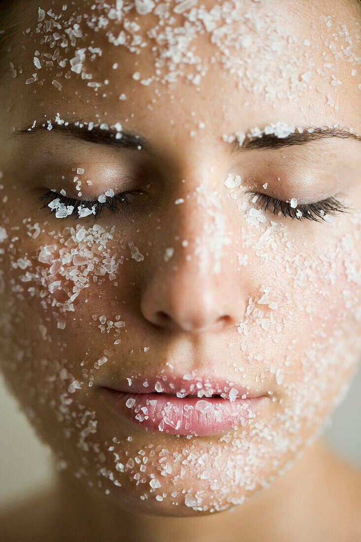 young woman with salt_peeling_mask