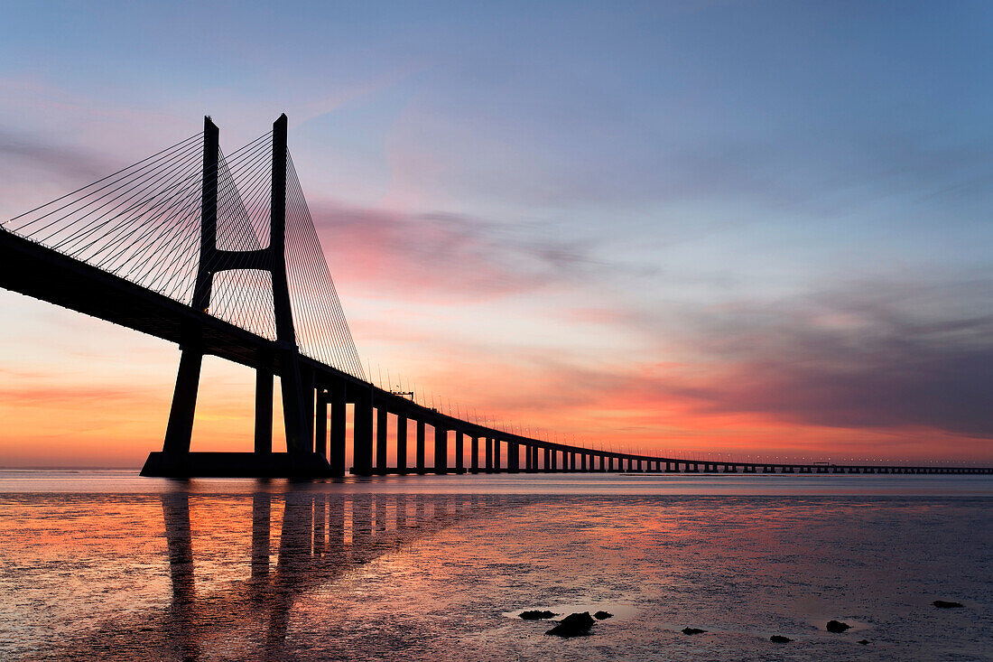 Vasco da Gama bridge at sunrise. Vasco da Gama bridge at sunrise