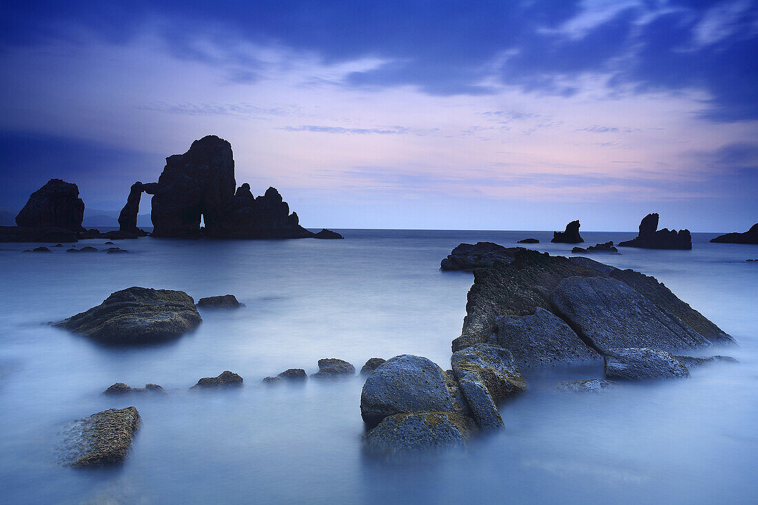 Fog rolling over rocky beach. Fog rolling over rocky beach