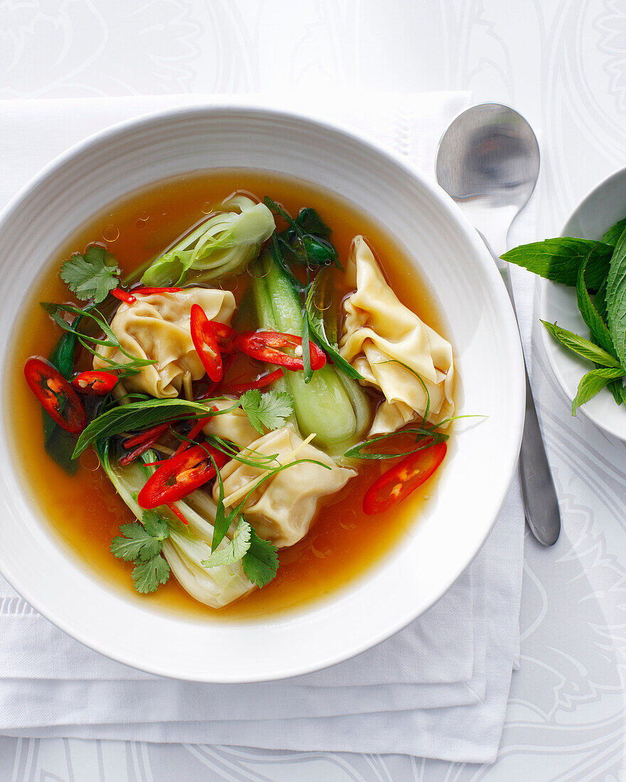 Bowl of vegetable and wonton soup. VegetableFondue