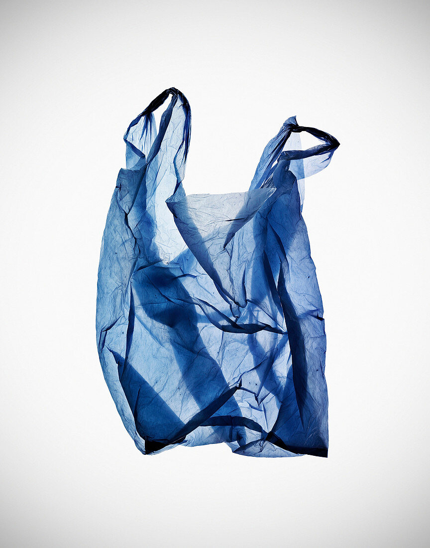 Crumpled blue plastic bag on table. Still Life, Plastic Bag,Plastic,Blue, see through,Graphic,Shadows, Art,Photo,Design