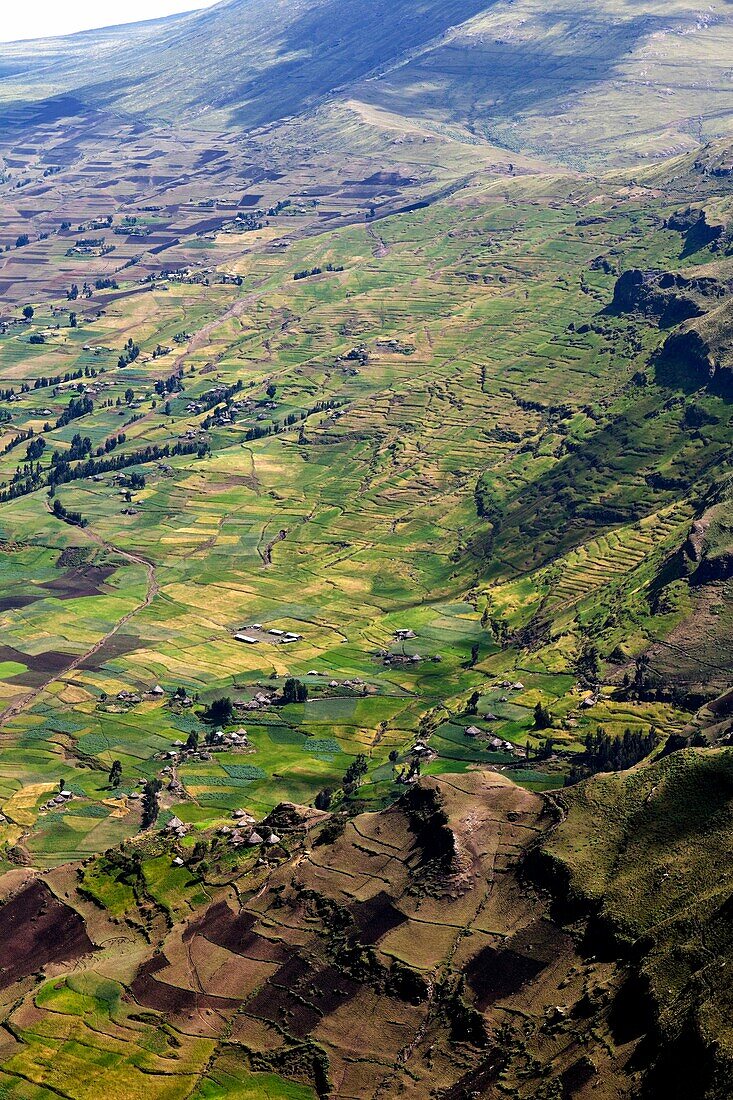 Landscape in the Simien Mountains National Park  Traditional farming communities at the cliffs of the escarpment  The Simien Semien, Saemen, Simen Mountains National Park is part of the UNESCO World heritage and is listed in the red list of threatened her
