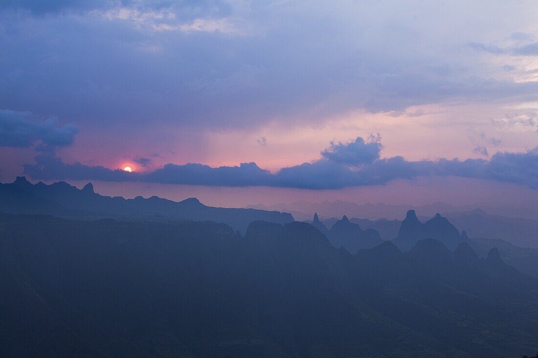 Landscape in the Simien Mountains National Park  Sunset over the escarpment the the lowlands  The Simien Semien, Saemen, Simen Mountains National Park is part of the UNESCO World heritage and is listed in the red list of threatened heritage  In terms of l