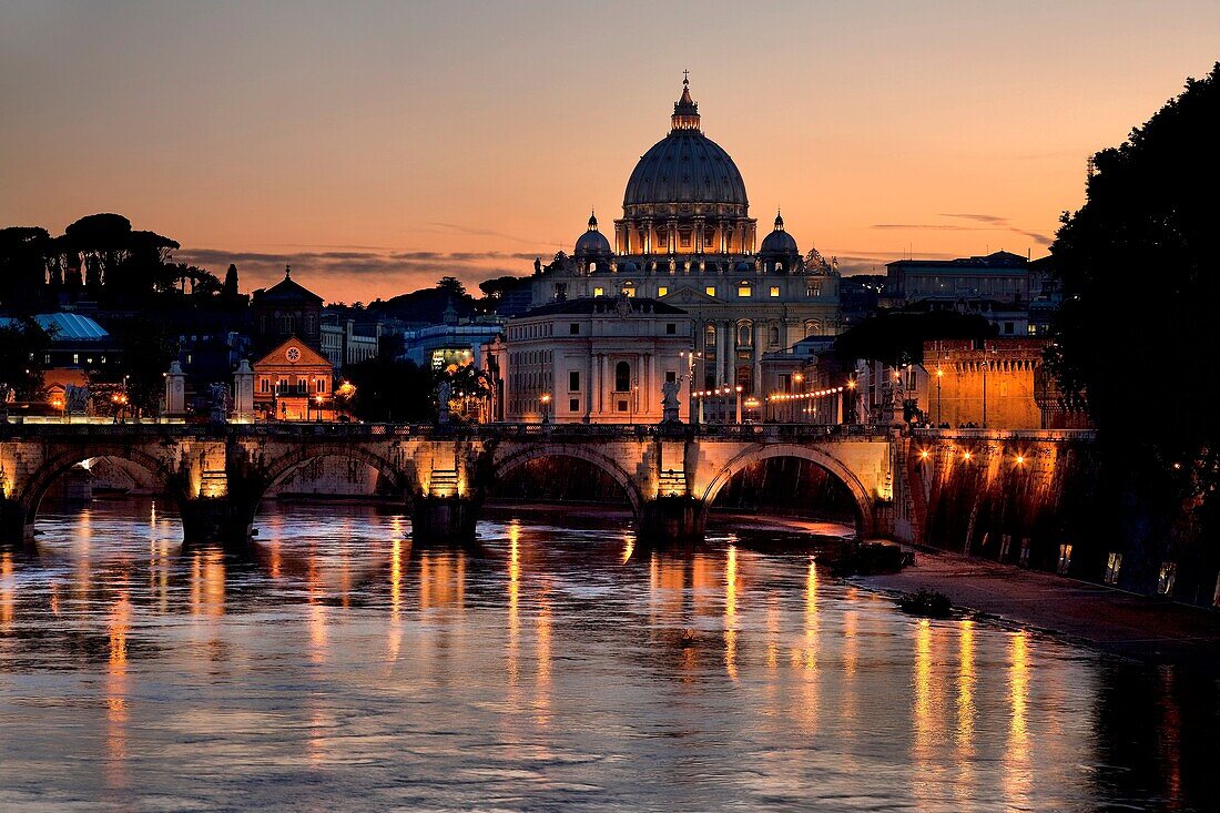 St  Peter´s Basilica at twilight from a bridge over the Tiber River