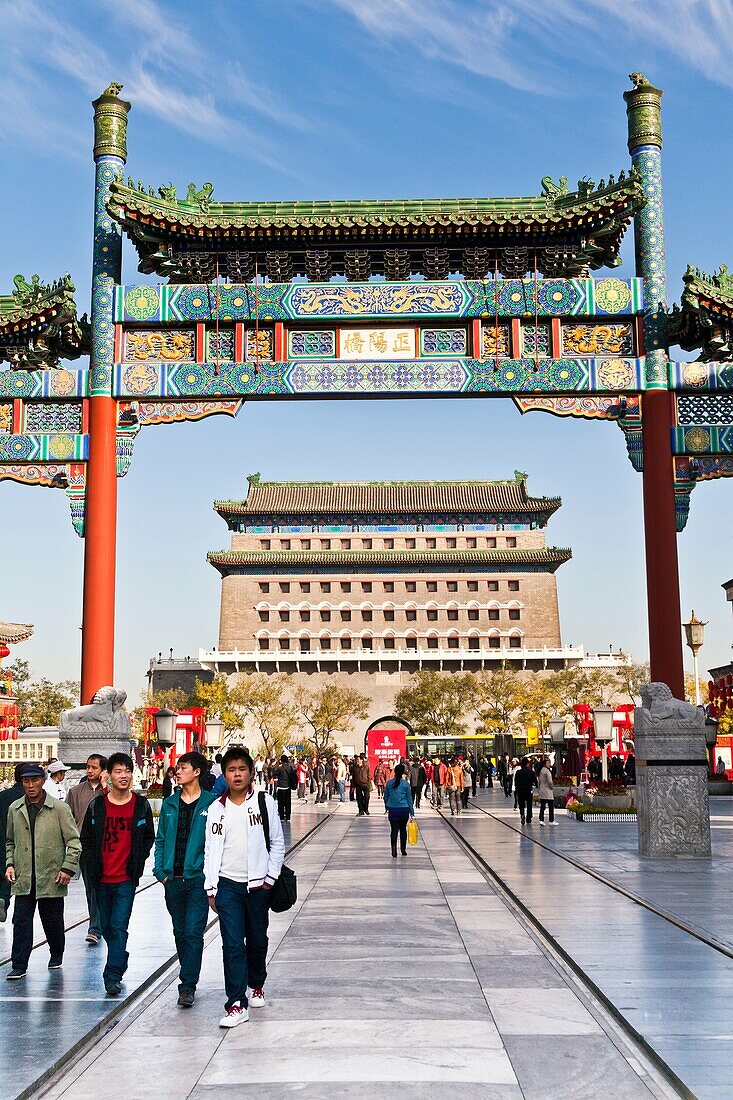 Archery tower, Qianmen Gate, behind colorful arch, Qianmen Street, Beijing, China