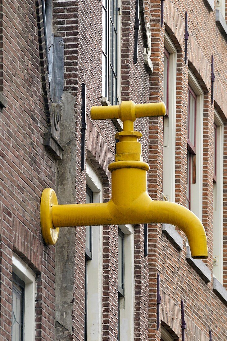 Statue of tap, Amsterdam, Holland