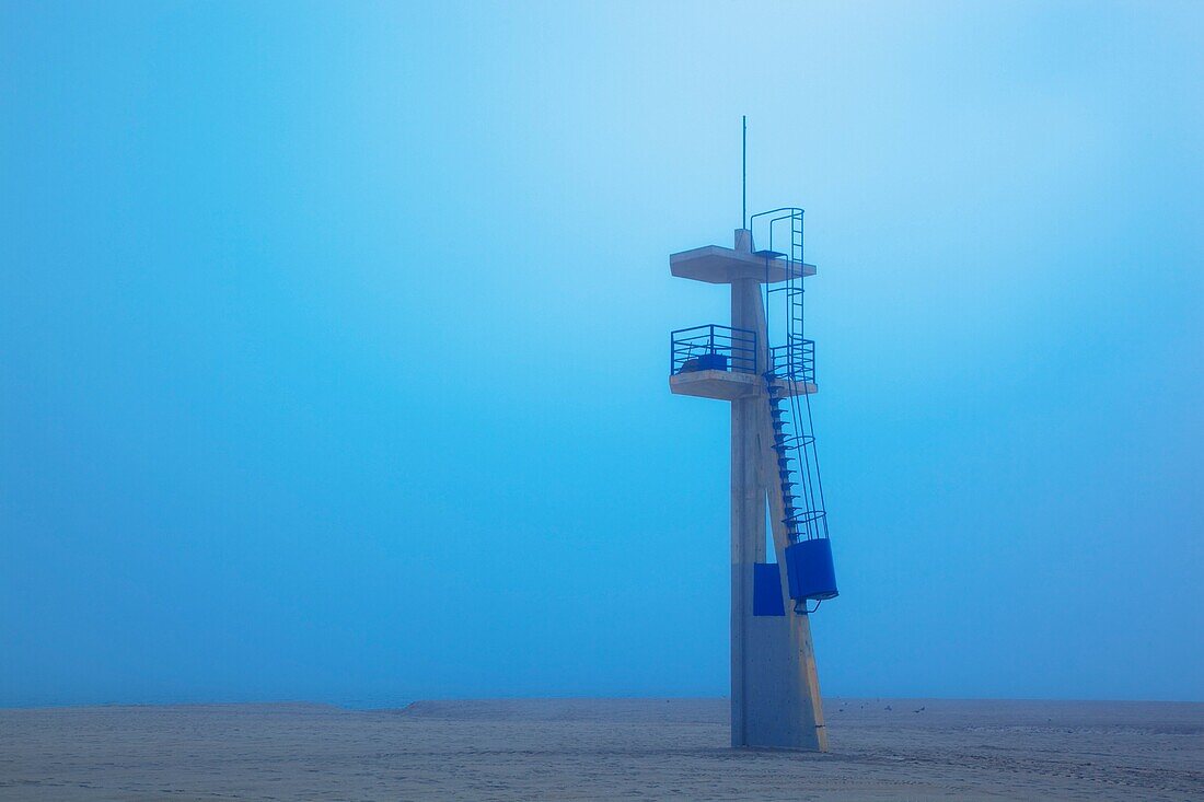 Lifeguard tower on Playamar beach in off-season on foggy day  Torremolinos, Malaga Province, Costa del Sol, Spain