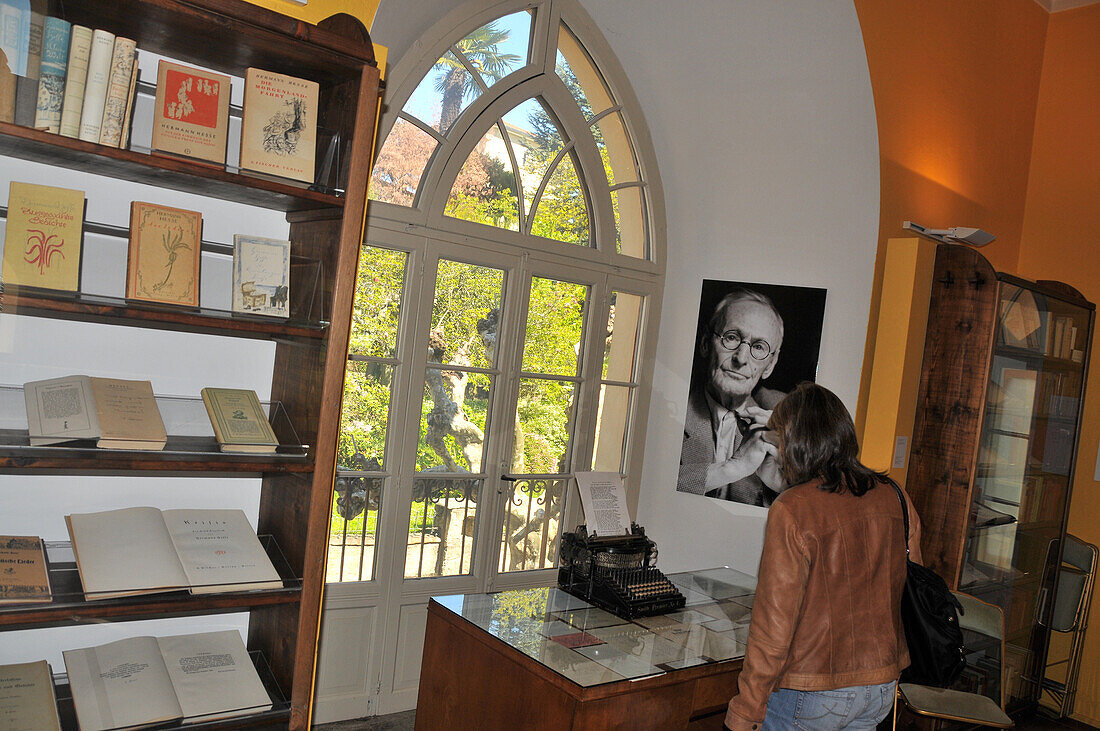 Woman inside of the Hermann Hesse museum in Montagnola at lake Lugano, Ticino, Switzerland, Europe