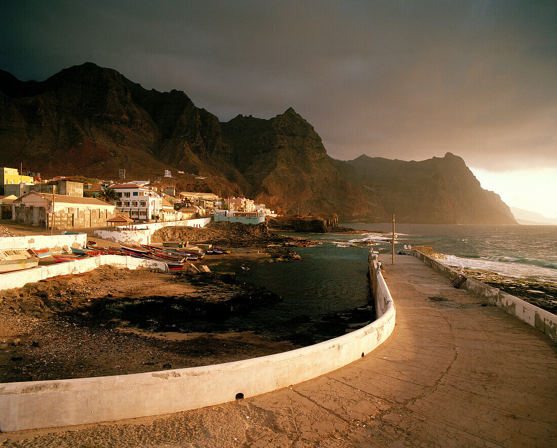 Quay wall of natural harbour Boca de Pistol in the evening sun, Ponta do Sol, Santo Antao, Ilhas de Barlavento, Republic of Cape Verde, Africa