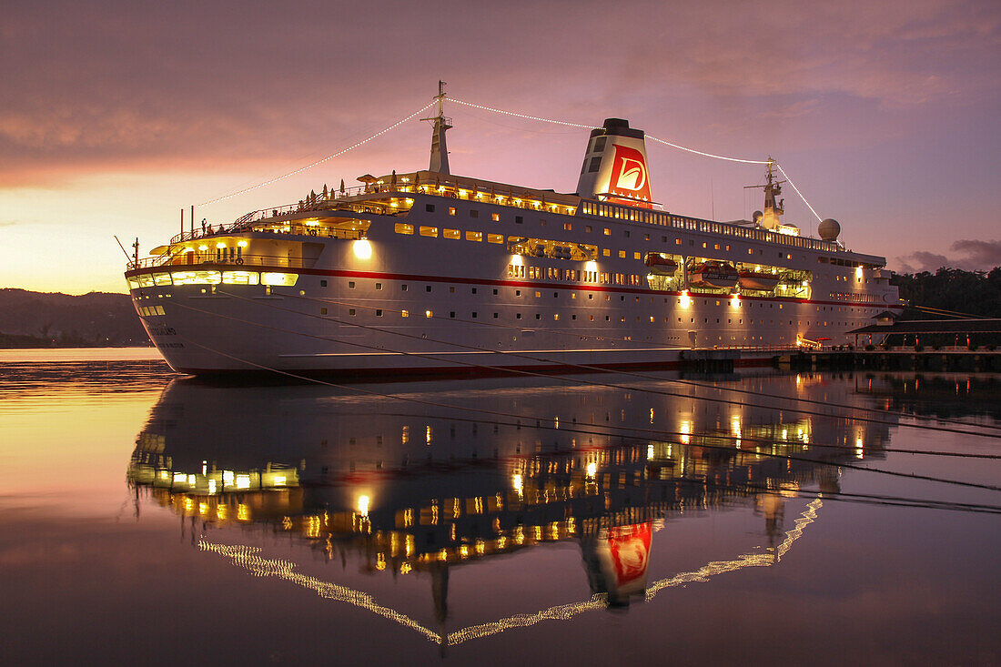 Cruise ship MS Deutschland (Reederei Peter Deilmann) in the harbour at sunset, Port Antonio, Portland, Jamaica, Caribbean