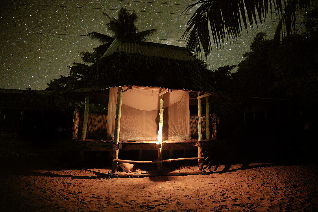Stars above a fale, traditional samoan accomodation without walls, Return to Paradise Beach, Upolu, Samoa, South Pacific
