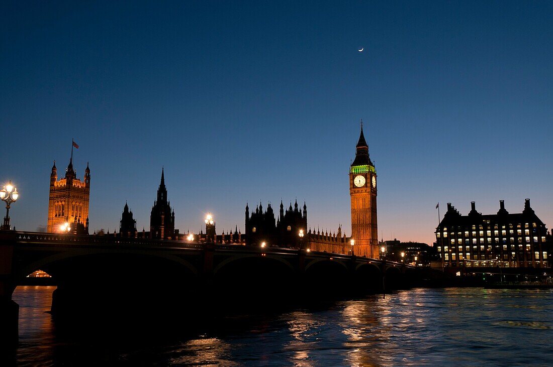 Palace of Westminster and Portcullis House during evening twilight, London, England