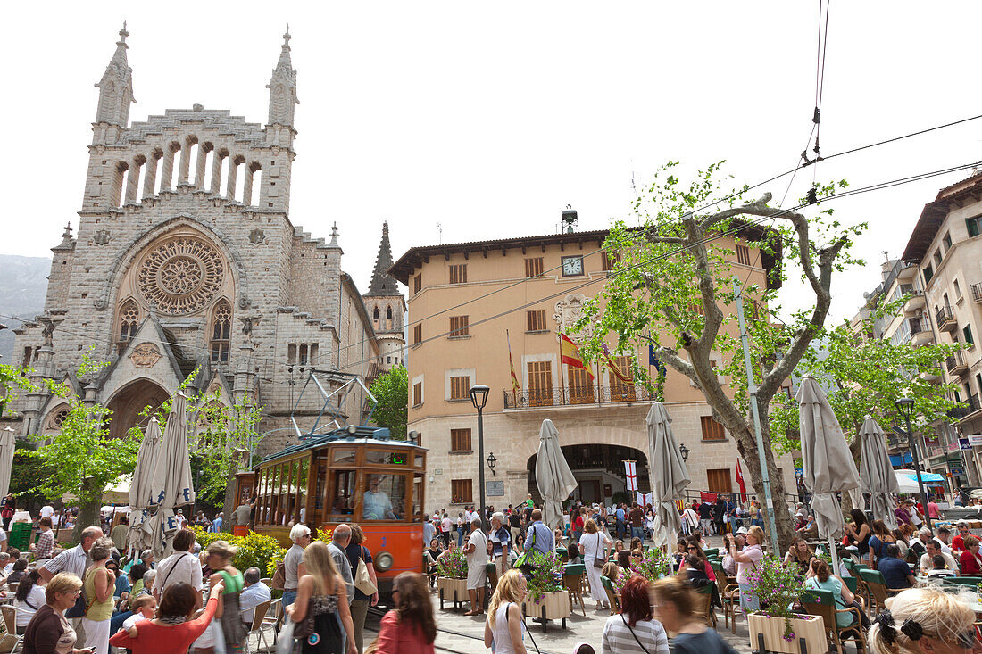 Saturday market, church Sant Bartomeu, town hall, historical tram between Soller and Palma, Tramuntana, Soller, Mallorca, Spain