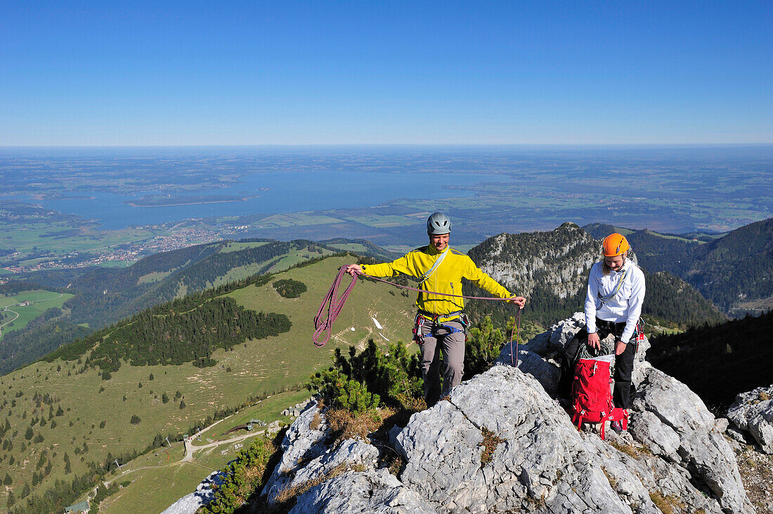 Two climbers on a rock, Kampenwand, Chiemgau Alps, Chiemgau, Upper Bavaria, Bavaria, Germany