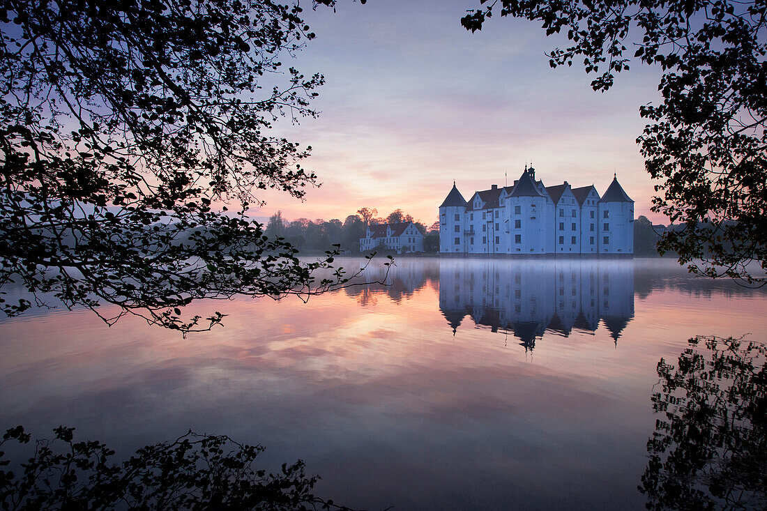 Gluecksburg moated castle at dawn, Flensburg fjord, Baltic Sea, Schleswig-Holstein, Germany, Europe